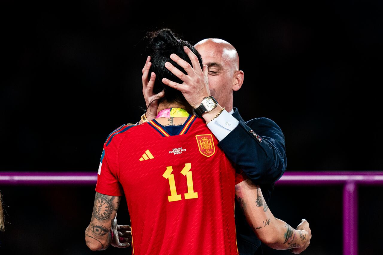 SYDNEY, AUSTRALIA - AUGUST 20: President of the Royal Spanish Football Federation Luis Rubiales (R) kisses Jennifer Hermoso of Spain (L) during the medal ceremony of FIFA Women's World Cup Australia & New Zealand 2023 Final match between Spain and England at Stadium Australia on August 20, 2023 in Sydney, Australia. (Photo by Noemi Llamas/Eurasia Sport Images/Getty Images)